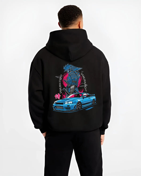 Black hoodie worn by a male model, back view, featuring Nissan Skyline R34 gt r r34 skyline drift jdm japanese street graphic.