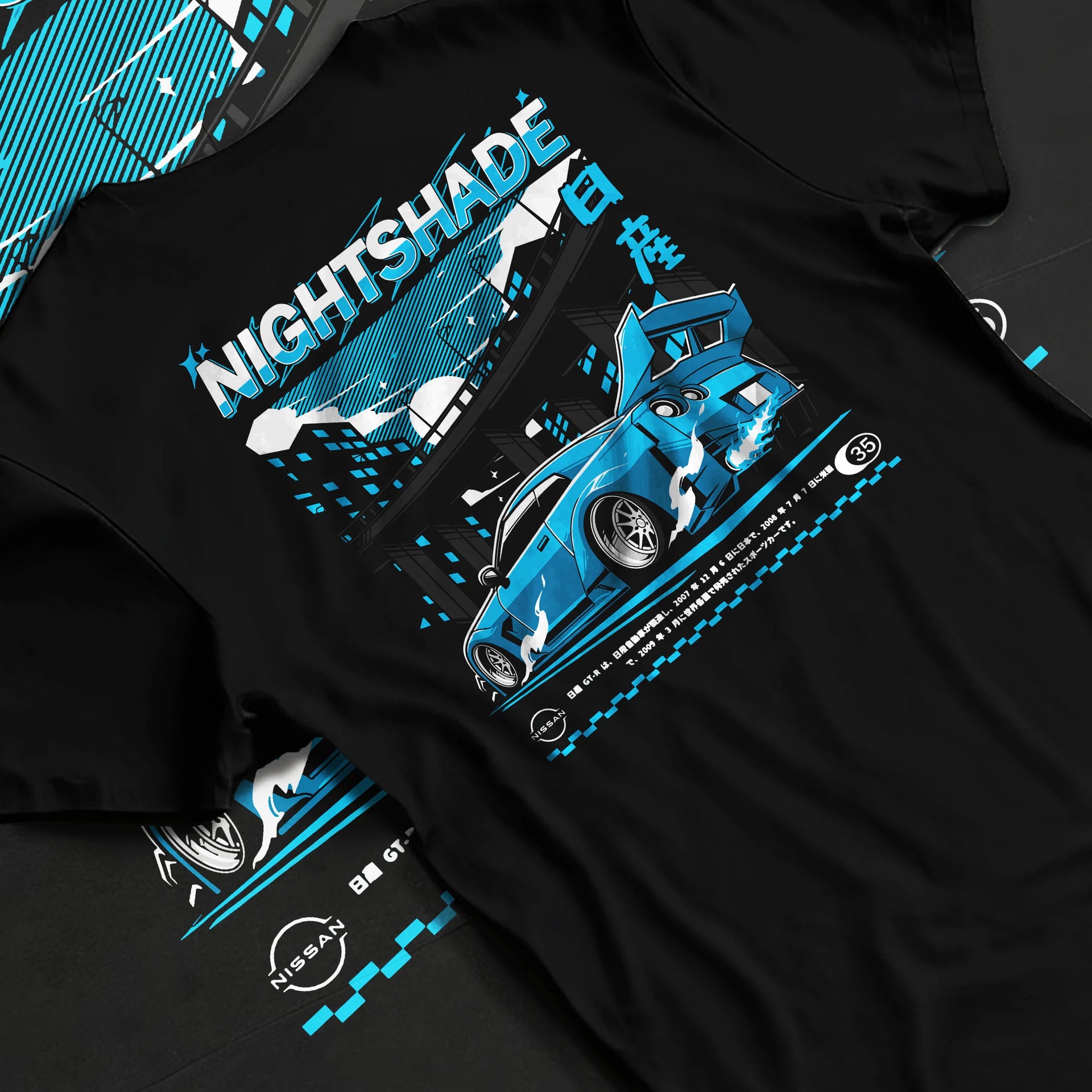 Black T-shirt laid flat with natural fabric folds, featuring Nissan GT-R R35 gt r r35 skyline racing drift jdm japanese graphic.