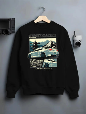 Black crewneck sweatshirt on a hanger against a grey wall, featuring Nissan Skyline drift jdm japanese tuner street retro graphic.
