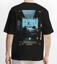 Black T-shirt worn by a male model, back view, featuring Nissan Skyline R34 r34 skyline turbo racing drift jdm japanese graphic.