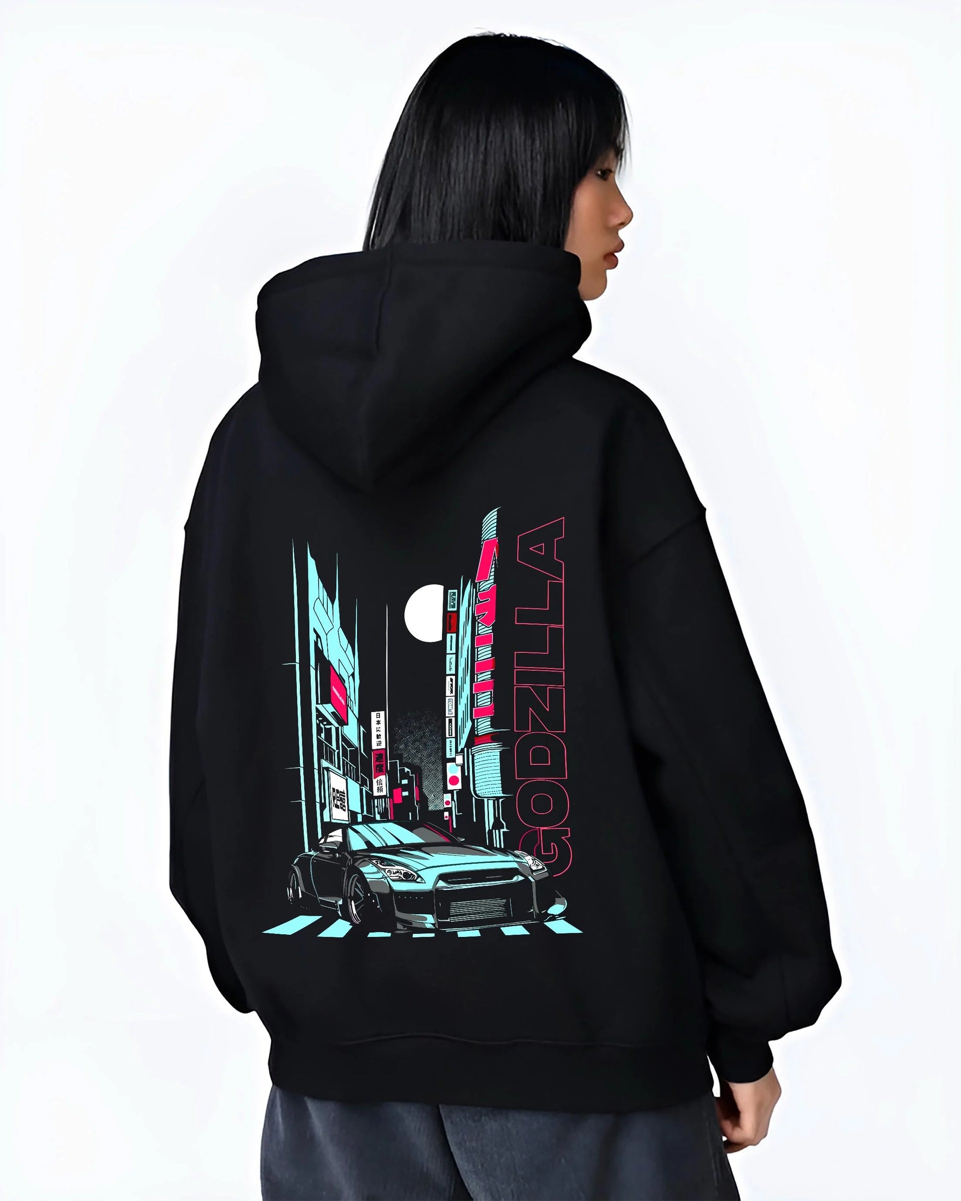 Black hoodie worn by a female model, back view, featuring Nissan GT-R gtr skyline racing drift jdm japanese street graphic.