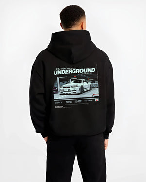 Black hoodie worn by a male model, back view, featuring Nissan 240SX rs turbo racing drift jdm japanese street classic graphic.