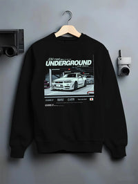 Black crewneck sweatshirt on a hanger against a grey wall, featuring Nissan 240SX rs turbo racing drift jdm japanese street graphic.