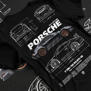 Black T-shirt laid flat with natural fabric folds, featuring Porsche 911 GT3 RS gt3 rs 911 racing motorsport street graphic.