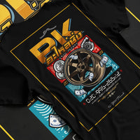 Black T-shirt laid flat with natural fabric folds, featuring street racing performance motorsport automotive enthusiast pkauto.