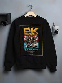 Black crewneck sweatshirt on a hanger against a grey wall, featuring street racing performance motorsport automotive pkauto.