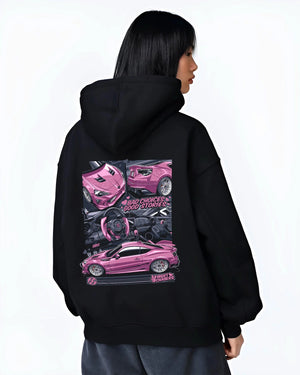 Black hoodie worn by a female model, back view, featuring Toyota 86 drift jdm stance street racing performance graphic.