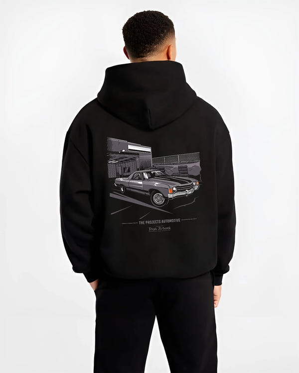 Black hoodie worn by a male model, back view, featuring CHEVROLET muscle retro classic enthusiast racing street performance graphic.