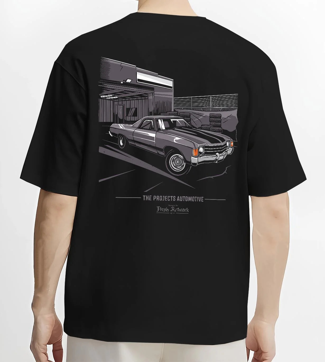 Black T-shirt worn by a male model, back view, featuring CHEVROLET muscle retro classic enthusiast racing street graphic.