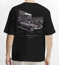Black T-shirt worn by a male model, back view, featuring CHEVROLET muscle retro classic enthusiast racing street graphic.