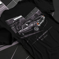 Black T-shirt laid flat with natural fabric folds, featuring CHEVROLET muscle retro classic enthusiast racing street graphic.