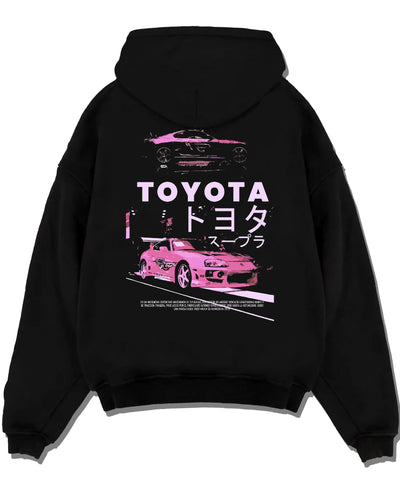 Black pullover hoodie laid flat on a white background, featuring Toyota Supra racing drift jdm japanese tuner street retro graphic.