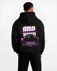 Black hoodie worn by a male model, back view, featuring Mercedes-Benz AMG racing street enthusiast performance motorsport graphic.