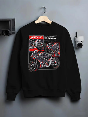 Black crewneck sweatshirt on a hanger against a grey wall, featuring Yamaha R1 racing street speed performance motorsport graphic.