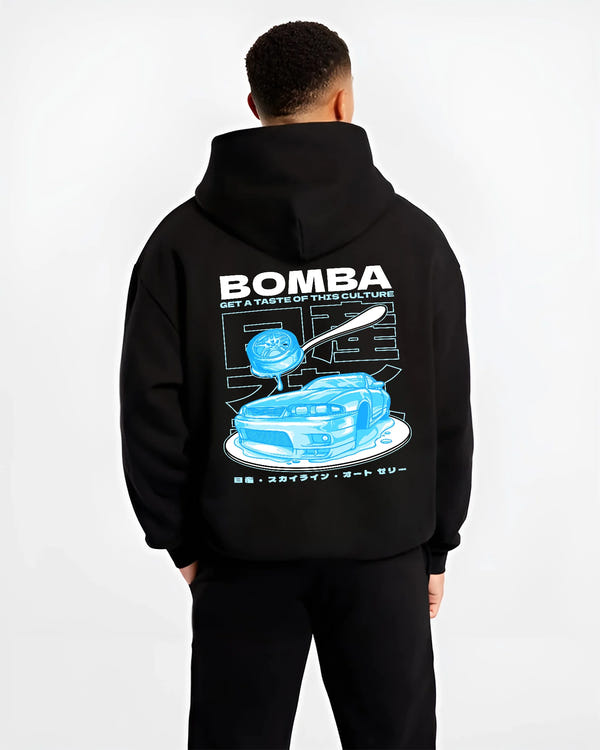 Black hoodie worn by a male model, back view, featuring Nissan Skyline R33 r33 skyline turbo turbocharged racing drift jdm graphic.