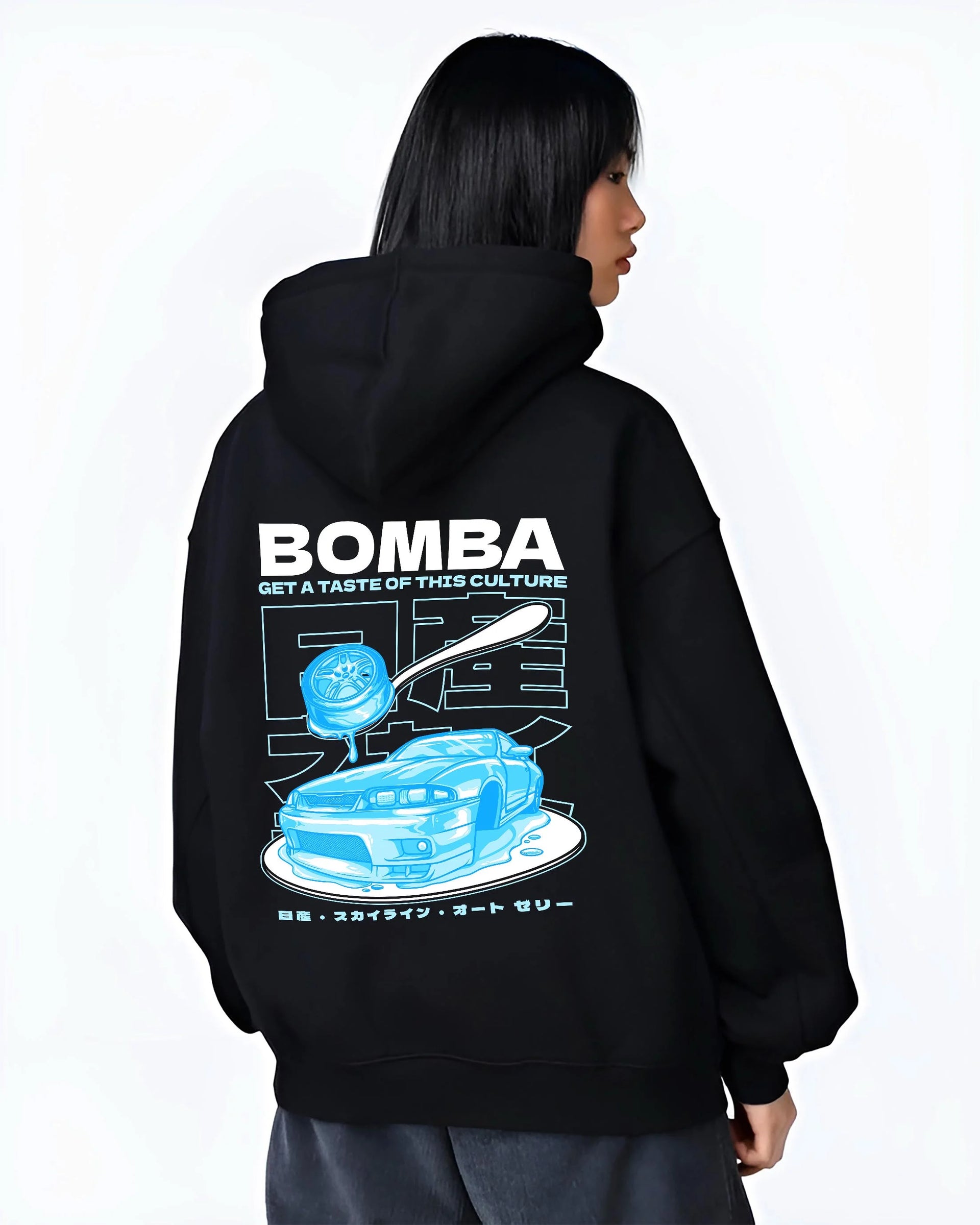Black hoodie worn by a female model, back view, featuring Nissan Skyline R33 r33 skyline turbo turbocharged racing drift graphic.