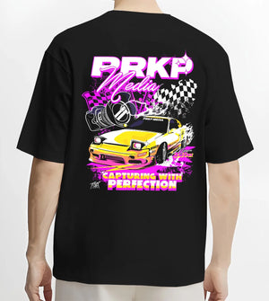 Black T-shirt worn by a male model, back view, featuring Nissan Skyline R34 gt r r34 skyline racing drift jdm japanese graphic.