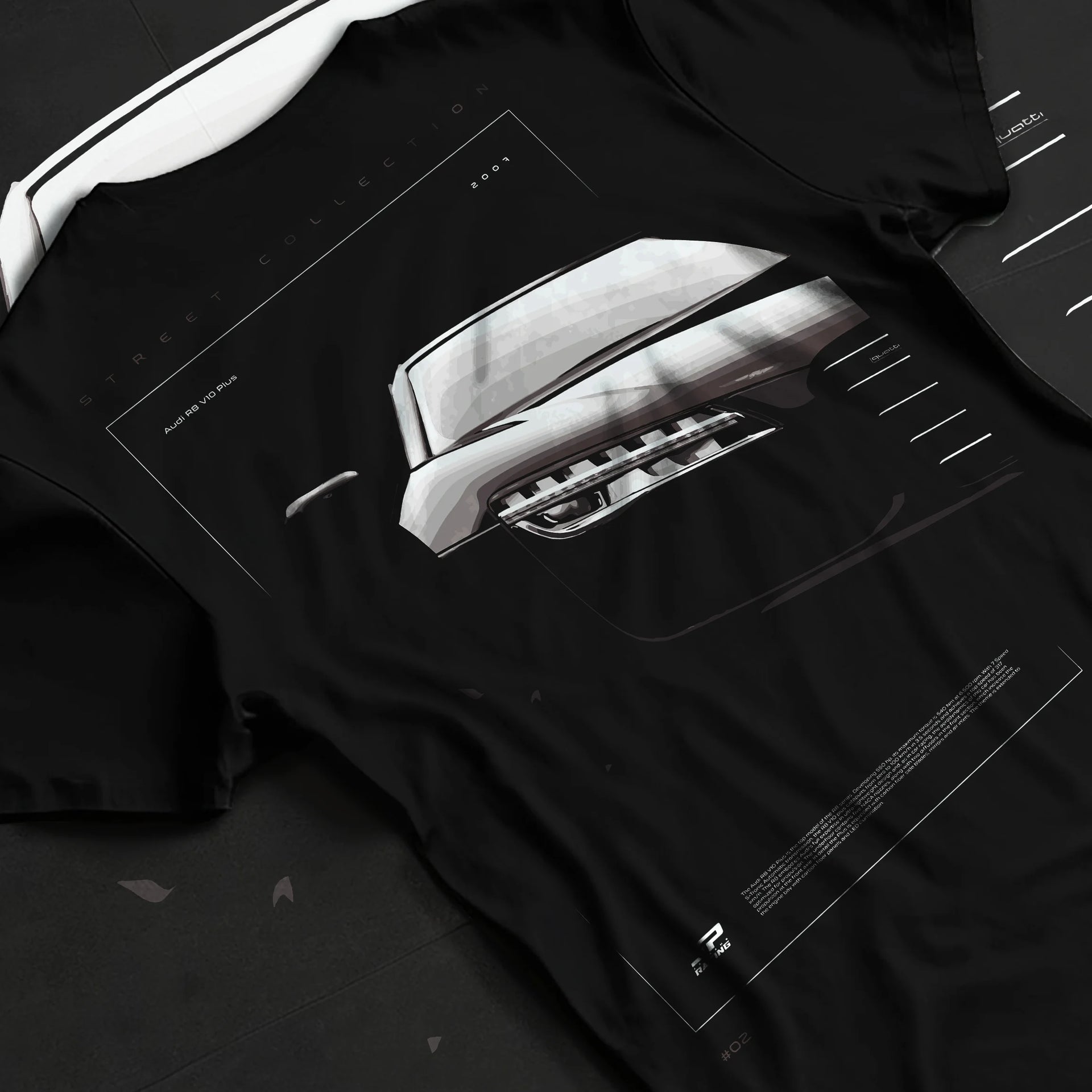 Black T-shirt laid flat with natural fabric folds, featuring Audi R8 turbo v10 racing german street performance graphic.
