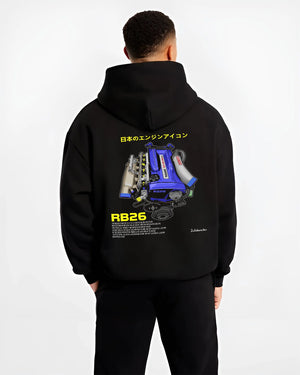 Black hoodie worn by a male model, back view, featuring SKYLINE turbo rb26 racing jdm japanese tuner legend power graphic.
