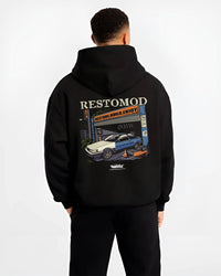Black hoodie worn by a male model, back view, featuring Toyota AE86 drift jdm tuner street racing performance graphic.