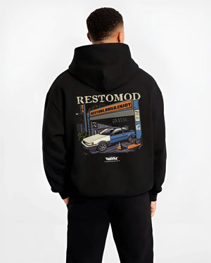Black hoodie worn by a male model, back view, featuring Toyota AE86 drift jdm tuner street racing performance graphic.