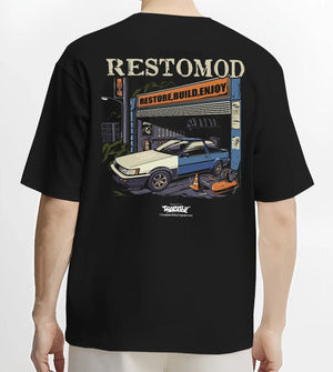 Black T-shirt worn by a male model, back view, featuring Toyota AE86 drift jdm tuner street racing performance graphic.