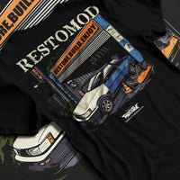 Black T-shirt laid flat with natural fabric folds, featuring Toyota AE86 drift jdm tuner street racing performance graphic.