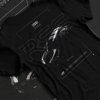Black T-shirt laid flat with natural fabric folds, featuring Audi RS6 rs turbo racing motorsport german street graphic.