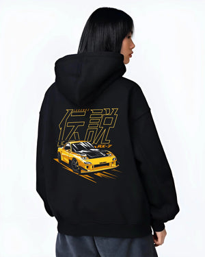 Black hoodie worn by a female model, back view, featuring Mazda RX-7 rx7 racing drift japanese tuner stance street legend graphic.