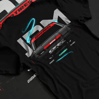 Black T-shirt laid flat with natural fabric folds, featuring Nissan Silvia S13 silvia racing drift jdm japanese street graphic.