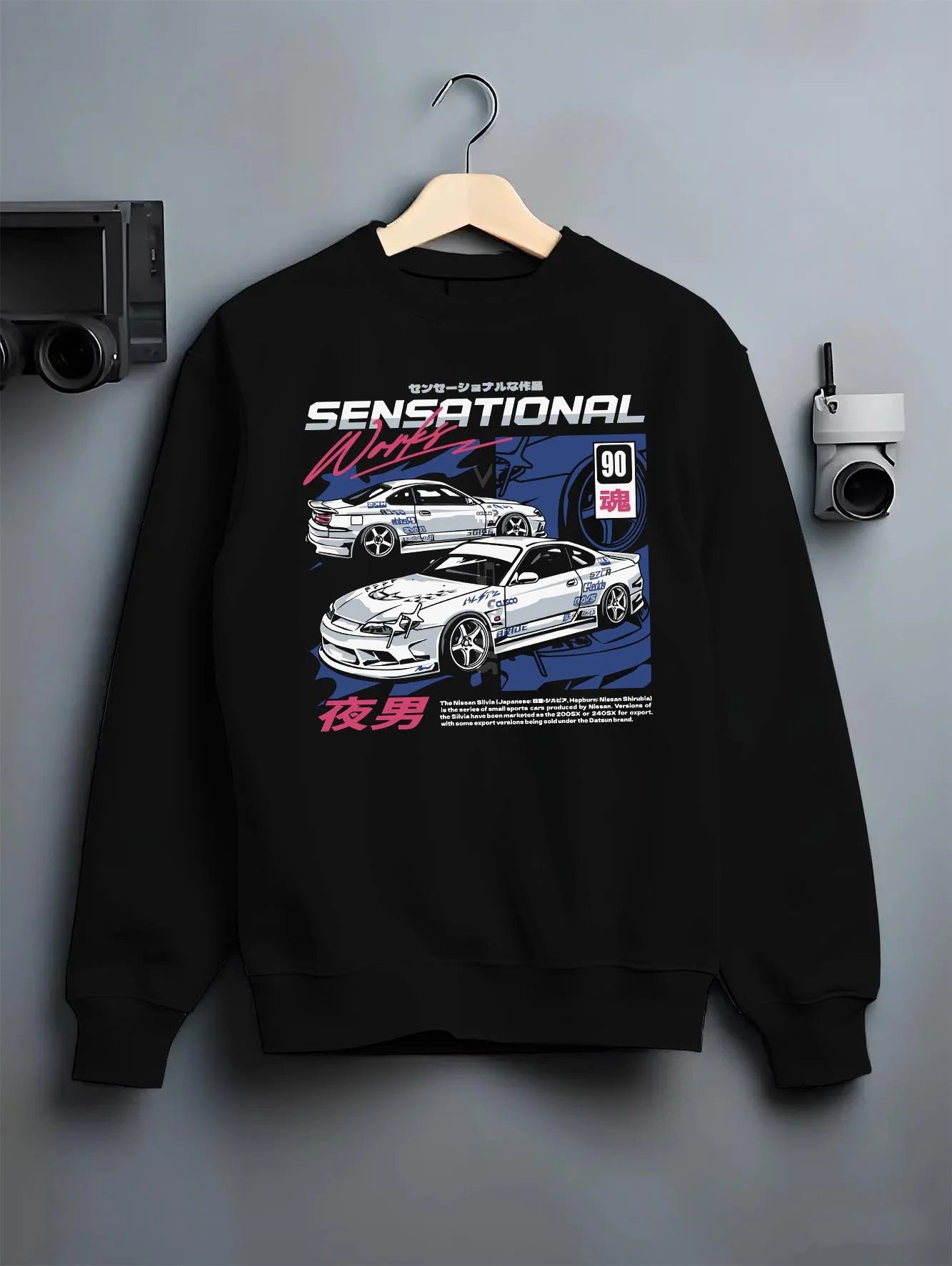 Black crewneck sweatshirt on a hanger against a grey wall, featuring Nissan Silvia S15 silvia racing drift jdm japanese s15sns.