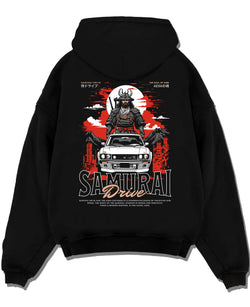 Black pullover hoodie laid flat on a white background, featuring drift japanese street racing performance motorsport graphic.