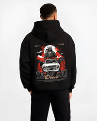 Black hoodie worn by a male model, back view, featuring drift japanese street racing performance motorsport automotive graphic.