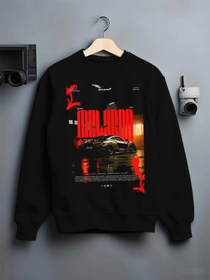 Black crewneck sweatshirt on a hanger against a grey wall, featuring McLaren SENNA track street racing performance graphic.