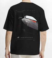 Black T-shirt worn by a male model, back view, featuring Lamborghini racing street enthusiast performance motorsport graphic.
