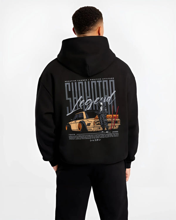 Black hoodie worn by a male model, back view, featuring Toyota jdm stance legend racing street performance motorsport graphic.