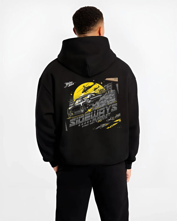Black hoodie worn by a male model, back view, featuring rs turbo turbocharged racing drift jdm japanese tuner tokyo street graphic.