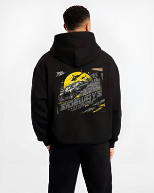 Black hoodie worn by a male model, back view, featuring rs turbo turbocharged racing drift jdm japanese tuner tokyo street graphic.