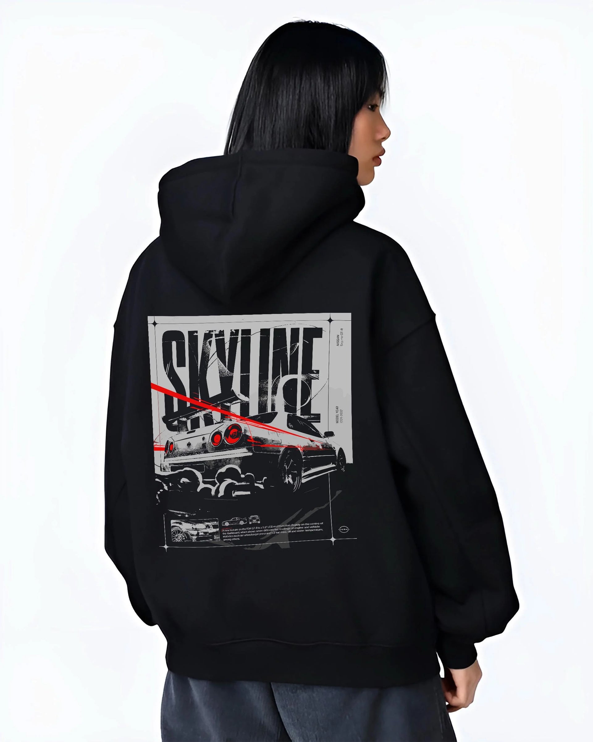 Black hoodie worn by a female model, back view, featuring Nissan Skyline R34 r34 skyline turbo turbocharged racing jdm graphic.