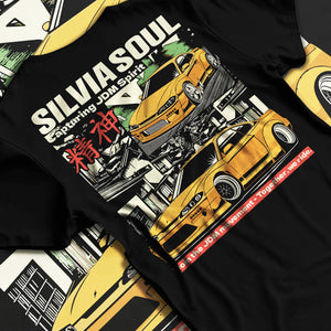 Black T-shirt laid flat with natural fabric folds, featuring Nissan Silvia S15 silvia drift jdm japanese street racing graphic.