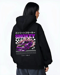 Black hoodie worn by a female model, back view, featuring racing drift muscle street retro classic performance motorsport graphic.