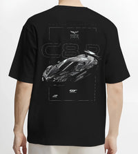 Black T-shirt worn by a male model, back view, featuring Chevrolet Corvette C6 corvette racing muscle street enthusiast graphic.