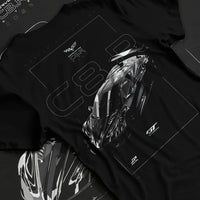 Black T-shirt laid flat with natural fabric folds, featuring Chevrolet Corvette C6 corvette racing muscle street enthusiast graphic.