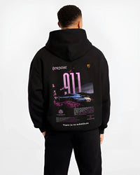 Black hoodie worn by a male model, back view, featuring Porsche 911 Turbo rs 911 turbo racing classic street graphic.
