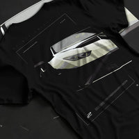 Black T-shirt laid flat with natural fabric folds, featuring rs turbo racing track street enthusiast performance motorsport graphic.