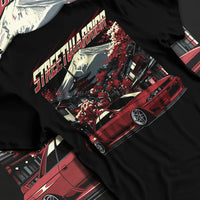 Black T-shirt laid flat with natural fabric folds, featuring SKYLINE r32 drift jdm street retro racing performance graphic.