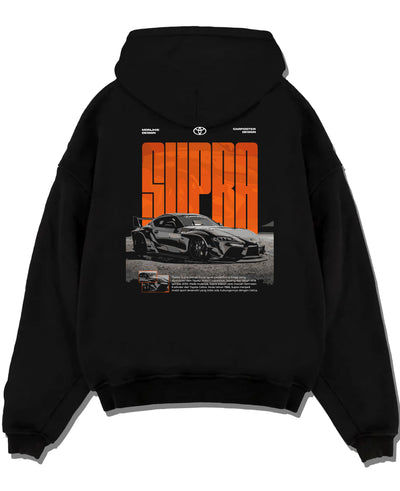 Black pullover hoodie laid flat on a white background, featuring Toyota Supra turbo racing drift jdm japanese tuner street supjdm.