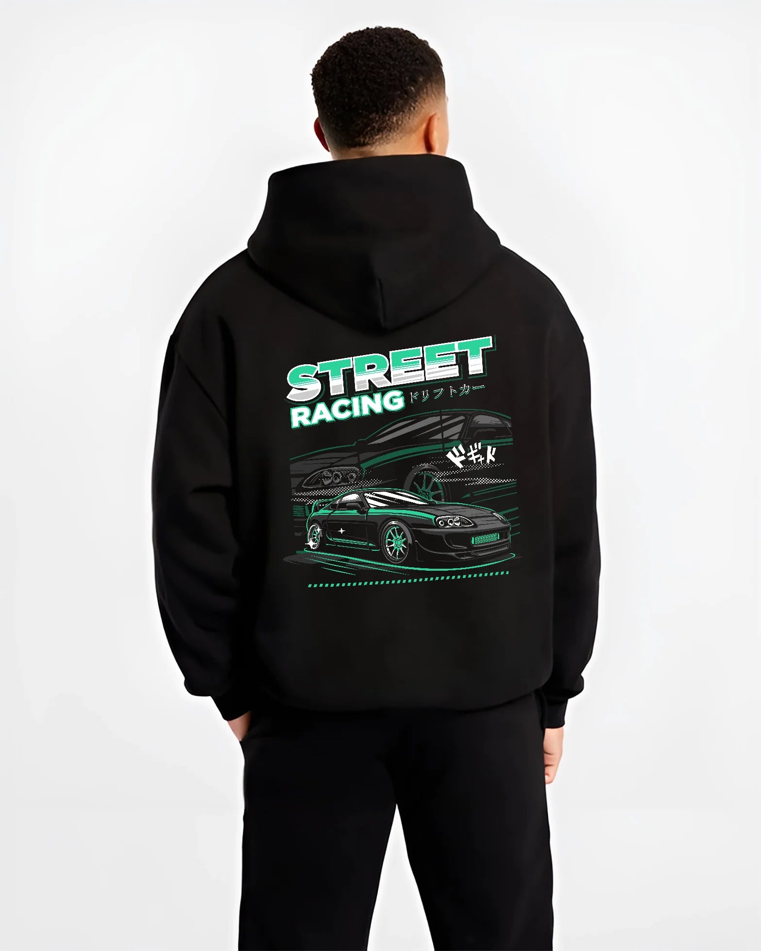 Black hoodie worn by a male model, back view, featuring Toyota Supra turbo jdm street racing performance motorsport graphic.