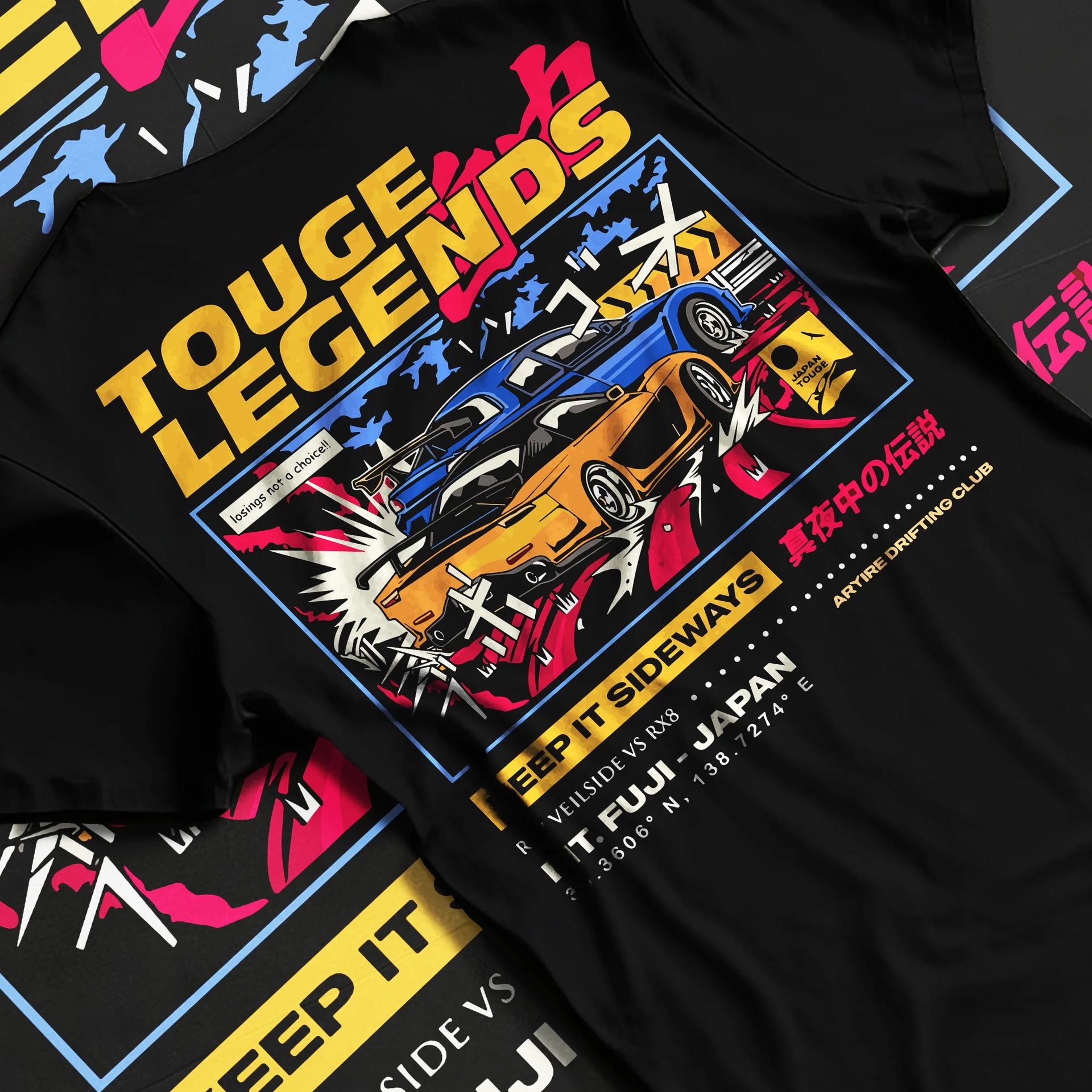 Black T-shirt laid flat with natural fabric folds, featuring RX7 ls racing drift jdm street legend performance graphic.