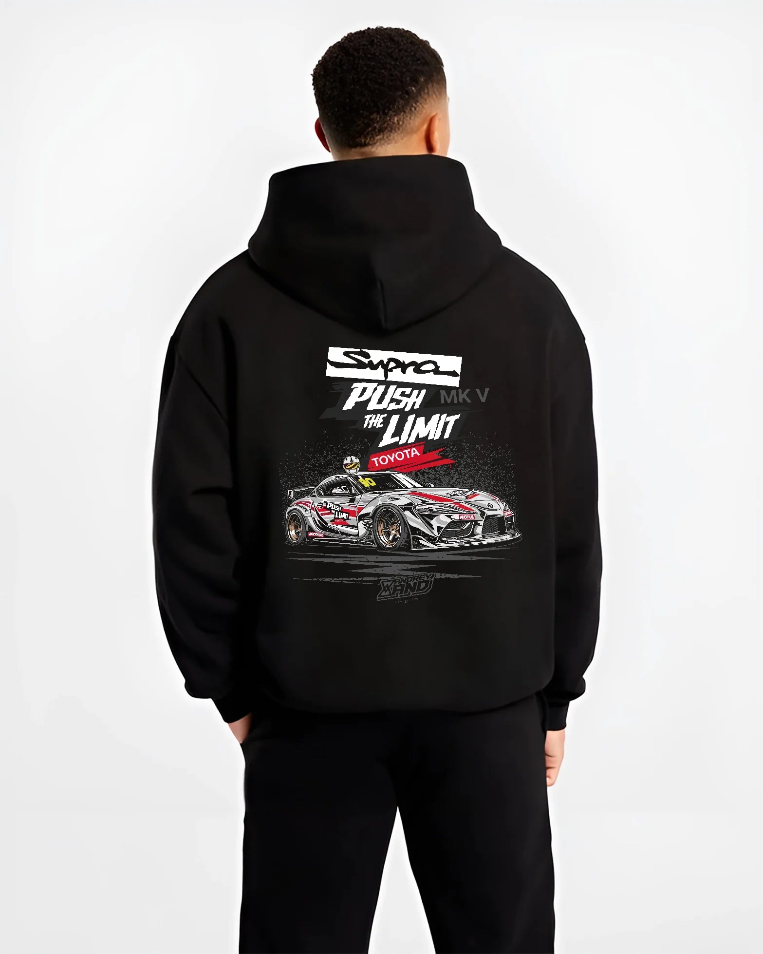 Black hoodie worn by a male model, back view, featuring Toyota Supra MK4 supra turbo turbocharged racing drift jdm tuner graphic.